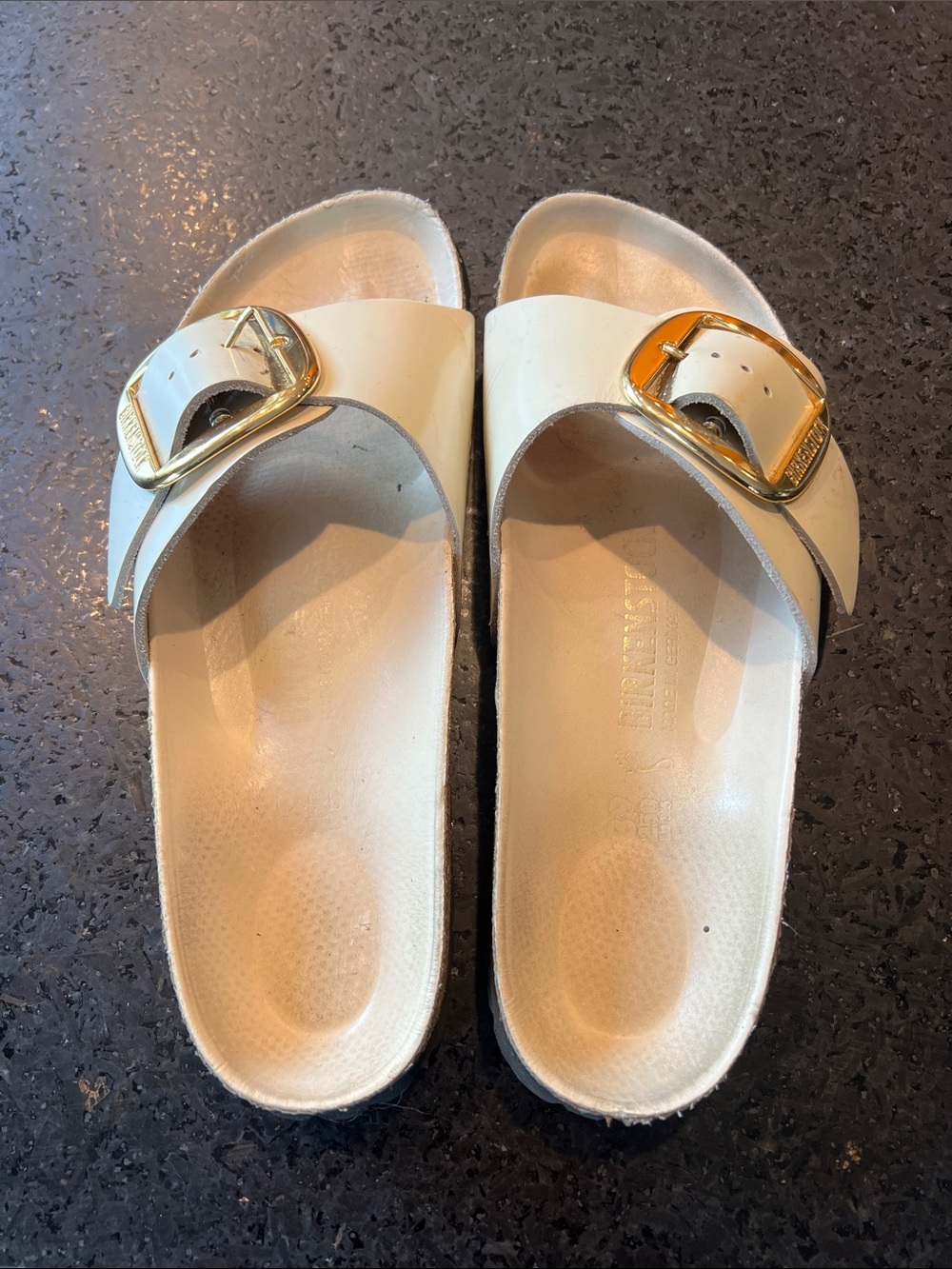 Birkenstock Cream Slide Sandals with Gold Buckles